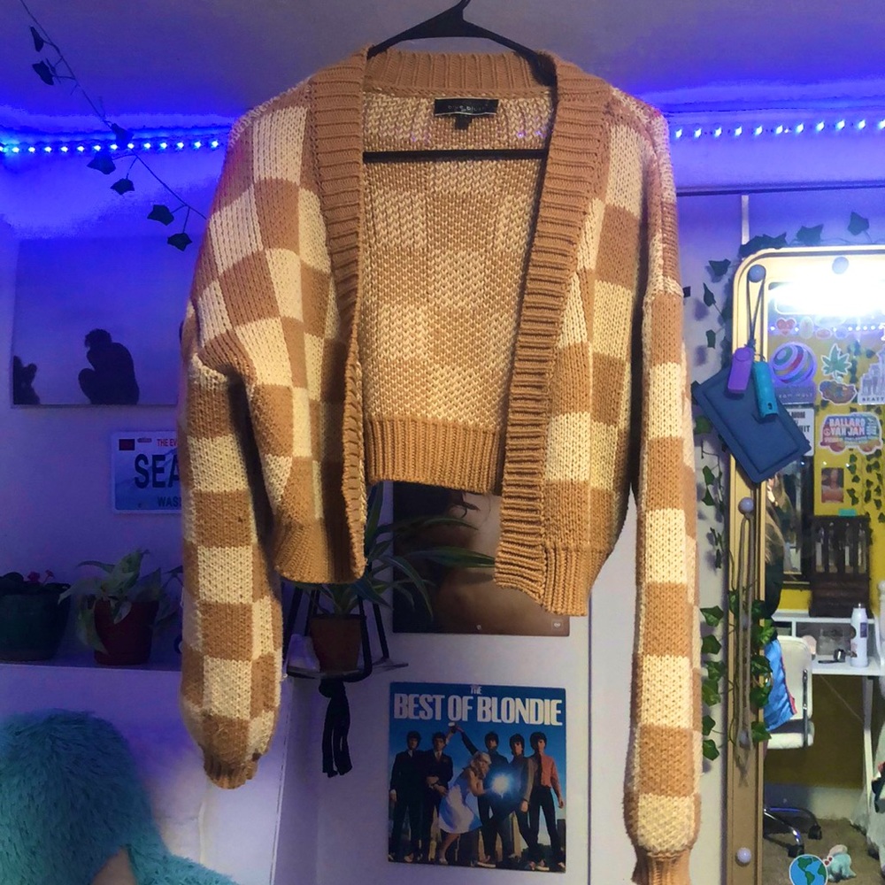 Oversized boutique style puffy sleeved brown and tan square cardigan